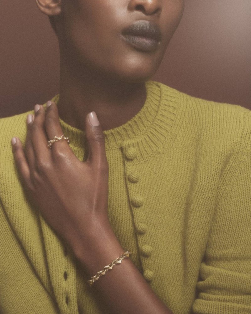The Everlasting Charm of Prada’s Eternal Gold Collection
