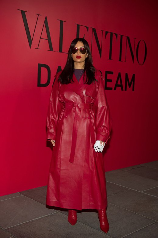 <strong>-Amina Muaddi </strong>wearing <strong>Valentino</strong><br />