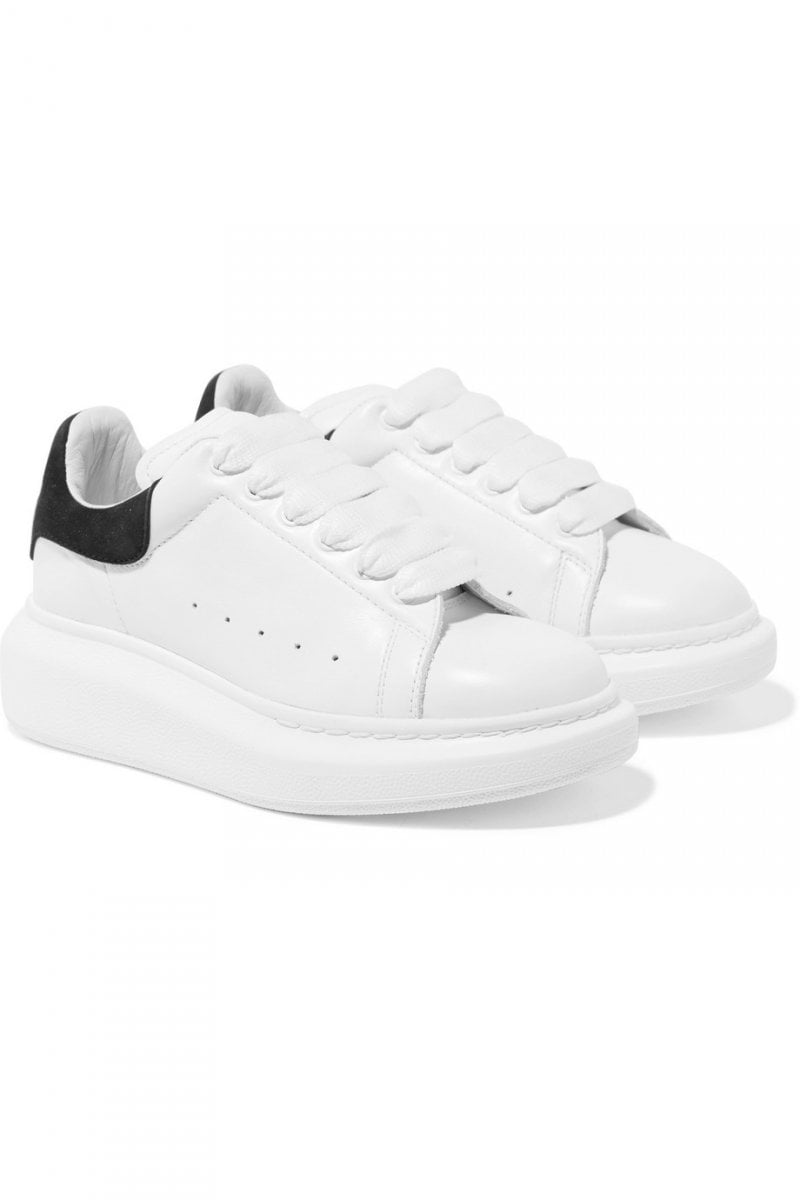 Alexander McQueen sneakers<br /> <em>Via Net-A-Porter</em>