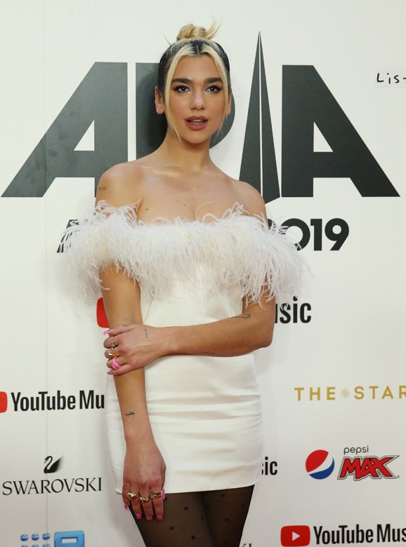 <strong>-Dua Lipa </strong>in <strong>Saint Laurent</strong>