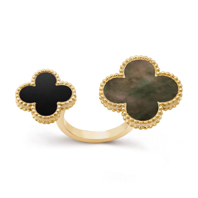 <strong>Van Cleef & Arpels </strong>Magic Alhambra between-the-finger ring<br />
 