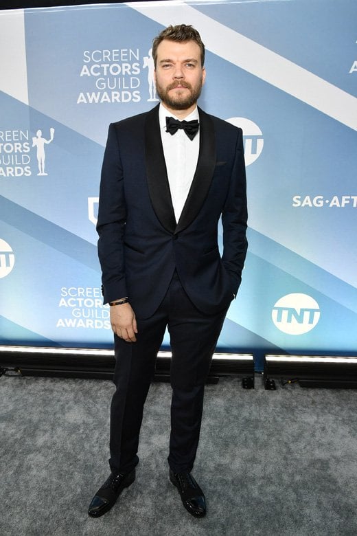 <strong>Pilou Asbaek</strong>, dazzling in a navy BOSS shawl collar tuxedo from the current Pre-Spring 2020 collection.<br />