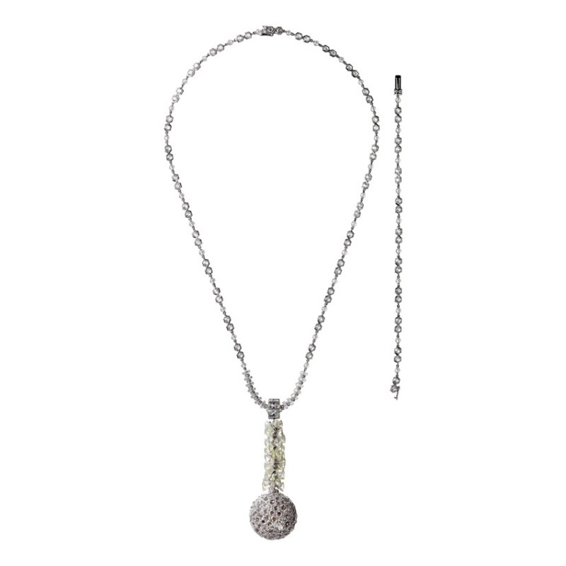 <strong>Cartier</strong>, Cartier Magicien high jewelry collection, Paillettes Solaires necklace featuring yellow triangular-shaped briolette-cut diamonds, as well as yellow and orange brilliant-cut diamonds