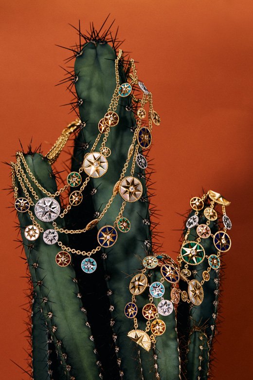<strong>Dior</strong>, Rose des Vents breastplate in yellow and white gold, set with diamonds, mother-of-pearl, lapiz lazuli, malachite, turquoise, onyx, tiger eye, carnelian and pink opal<br /> <strong>Dior</strong>, Rose des Vents bracelet in yellow, white and pink gold, set with diamonds, onyx, malachite, mother-of-pearl, lapis lazuli, pink opal, turquoise, tiger eye and carnelian