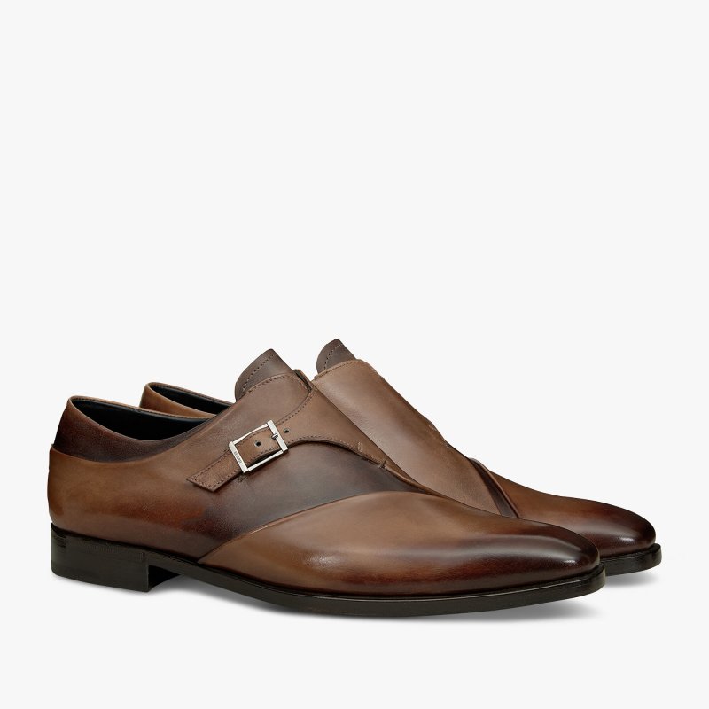 <strong>The Brown Brogues</strong><br /> <em>Photo Courtesy of Berluti</em><br />
Why is it on top of the list? Many are the reasons. You might ask yourself why would you invest in these shoes, but when you do, you will soon discover how stylish and versatile they are. In fact, they can be paired with jeans, and will look equally great with a casual look that’s more on the formal side – think an outfit fit for a business day.