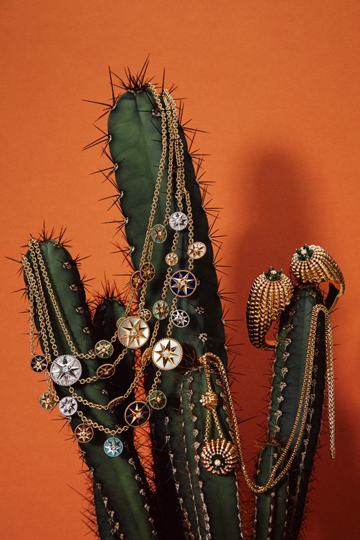<strong>Dior</strong>, Rose des Vents breastplate in yellow and white gold, set with diamonds, mother-of-pearl, lapiz lazuli, malachite, turquoise, onyx, tiger eye, carnelian and pink opal<br /> <strong>Cartier</strong>, Cactus de Cartier necklace in yellow gold, set with Sannan-Skarn and diamonds<br /> <strong>Cartier</strong>, Cactus de Cartier bracelet in yellow gold, set with Sannan-Skarn and diamonds