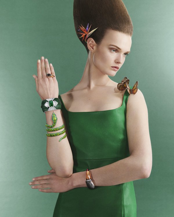The Leaf Woman and her lush, untouched rainforest vibrating to the beat of a dreamy nature through combinations of aluminum with an intense green color coming from a cataphoresis treatment, fine lines of diamonds embracing a stunning 37.97-carat green tourmaline, real butterfly wings framed by gold structures, and a marvelous palette of colored stones.