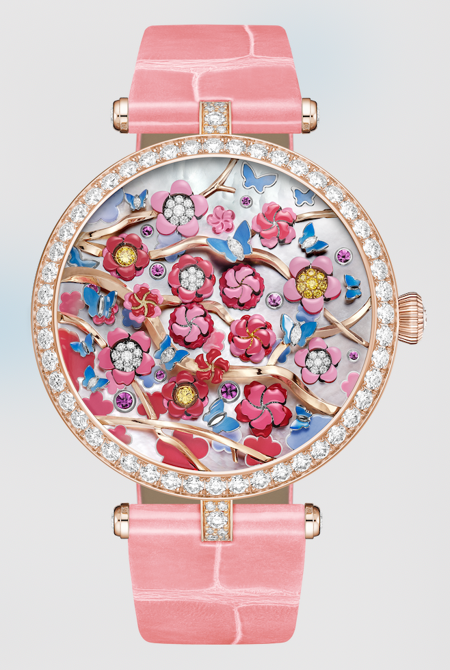 Inspired by the floral clock concept developed by Carl Von Linné in his 1751 book “Philosophia Botanica”, the <strong>Lady Arpels Heures Florales Cerisier</strong> watch poetically expresses the passage of time through its three-dimensional dial featuring 12 opening and closing corollas every 60 minutes.