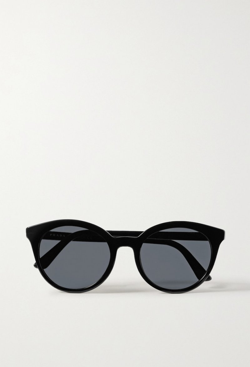 Prada sunglasses<br /> <em>Via Net-A-Porter</em><br />
&nbsp;