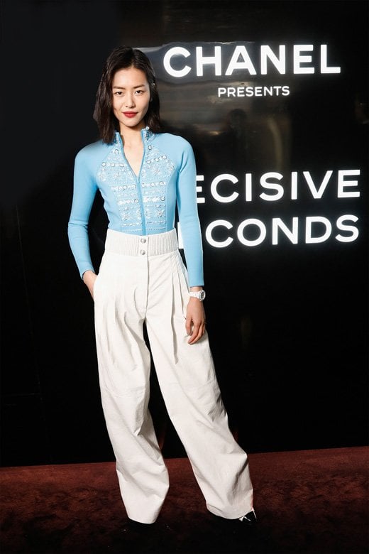 <strong>Liu Wen</strong>, CHANEL Ambassador and Muse of the new J12 watch, wore a blue neoprene body and off-white leather pants from the Fall-Winter 2019/20 Ready-to-Wear collection, CHANEL shoes and makeup paired with CHANEL’s “Coco crush” ring in 18K white gold, yellow gold and diamonds, “Coco crush” ring in 18K white gold, and “J12” watch in white ceramic.<br />
 