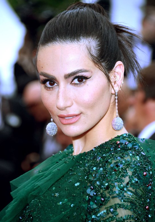 <strong>Diala Makki</strong> pairs her emerald green dress with <strong>Chopard</strong> jewels<br />
 