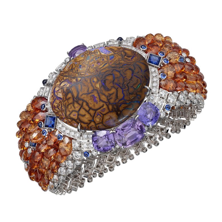 <strong>Cartier</strong>, Magnitude high jewelry collection, Zemia bracelet featuring a 77.27-carat cabochon-cut matrix opal and spessartite garnets<br />
 