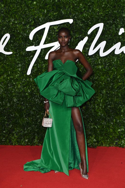 <strong>-Adut Akech </strong>wearing <strong>Valentino</strong><br />