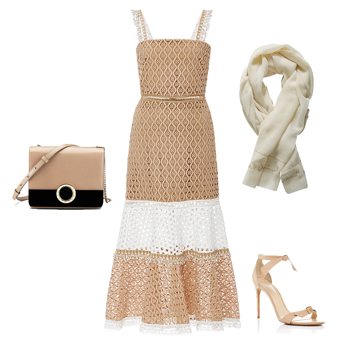 -<strong>هايلي بالدوين</strong> تخطف الأنفاس في فستان من <strong>كارولينا هيريرا</strong><br />
<em>صورة من هارفي نيكلز-دبي</em><br />
&nbsp;