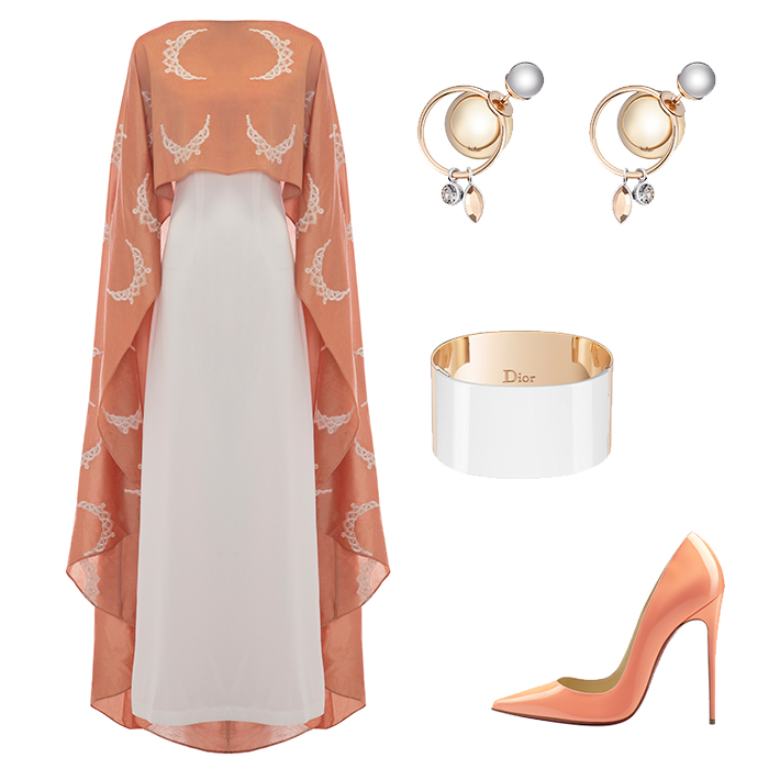 -عارضة الأزياء <strong>كريسي تايغن</strong> ترتدي فستاناً شفّافاً من <strong>ماركيزا كوتور</strong><br />
<em>صورة من هارفي نيكلز-دبي</em><br />
&nbsp;